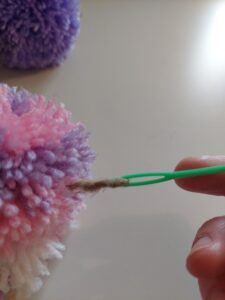 Faire une guirlande en pompons