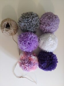 6 pompons en laine